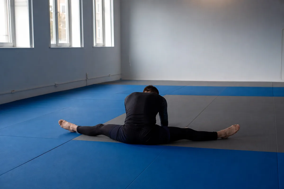Souplesse des jambes : le yoga du grappler